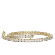 4 Carat Yellow Gold Round Shape Diamond Tennis Bracelet With Prong Setting.